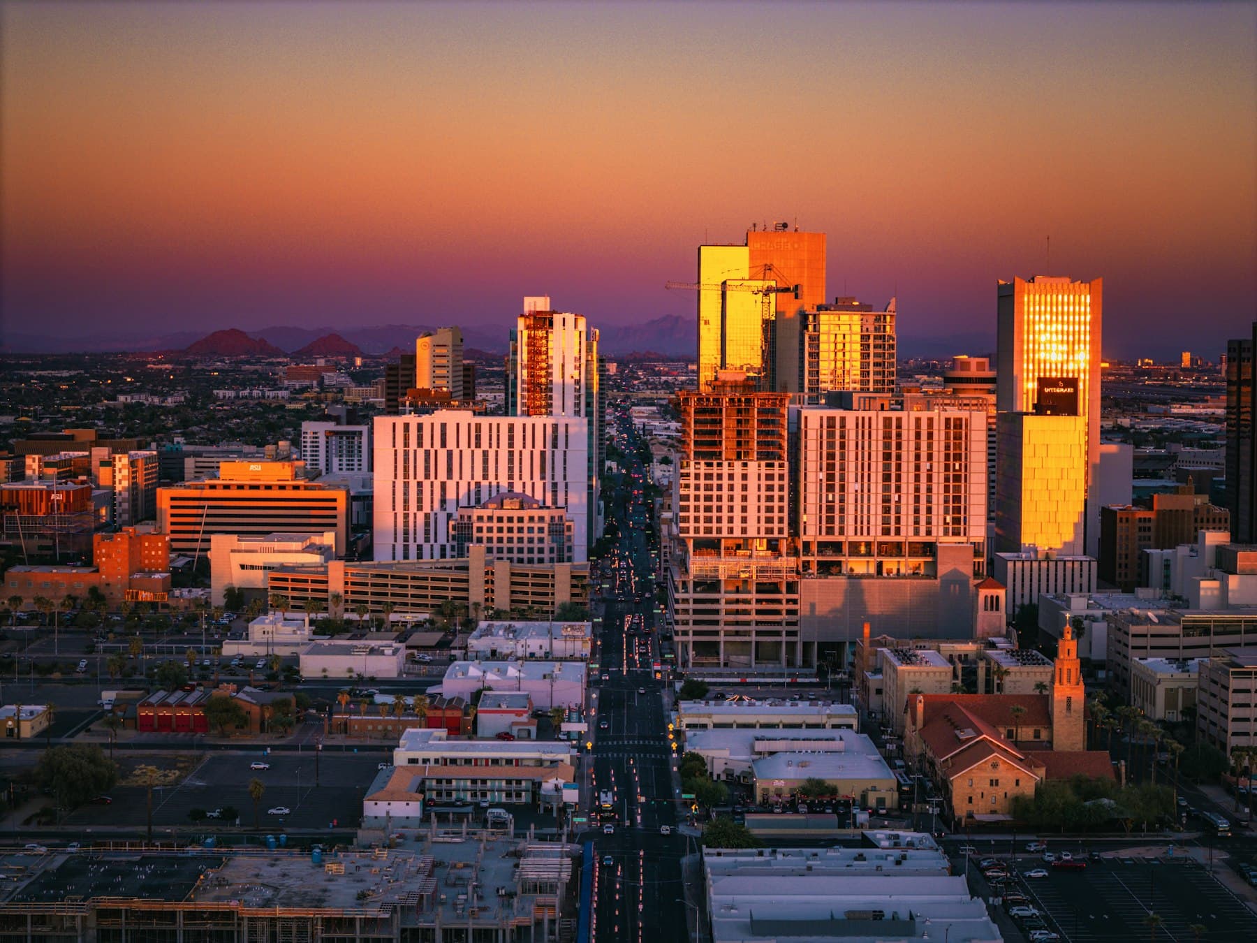 Phoenix, AZ — A view of a city with tall buildings